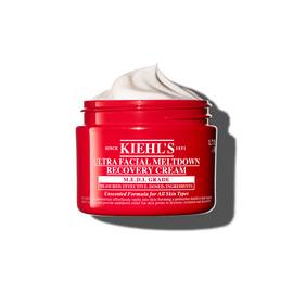 Crvena posudica kreme Kiehl’s Ultra Facial Meltdown Recovery Cream Whip, koja prikazuje pjenastu teksturu.