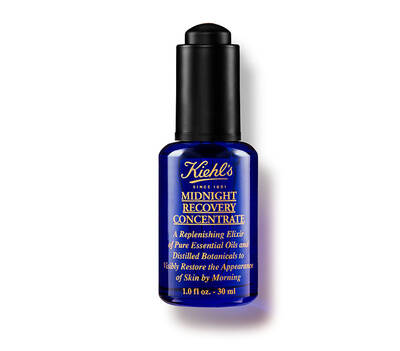 Bočica Kiehl's Midnight Recovery Concentrate, plava, s crnim poklopcem, namijenjena obnavljanju kože preko noći.