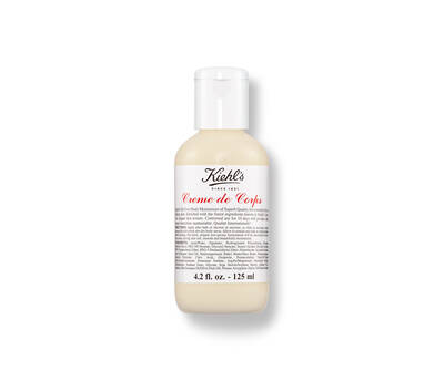 Bočica Kiehl's Creme de Corps losiona za tijelo, od 125 ml, s elegantnim bijelim etiketama.