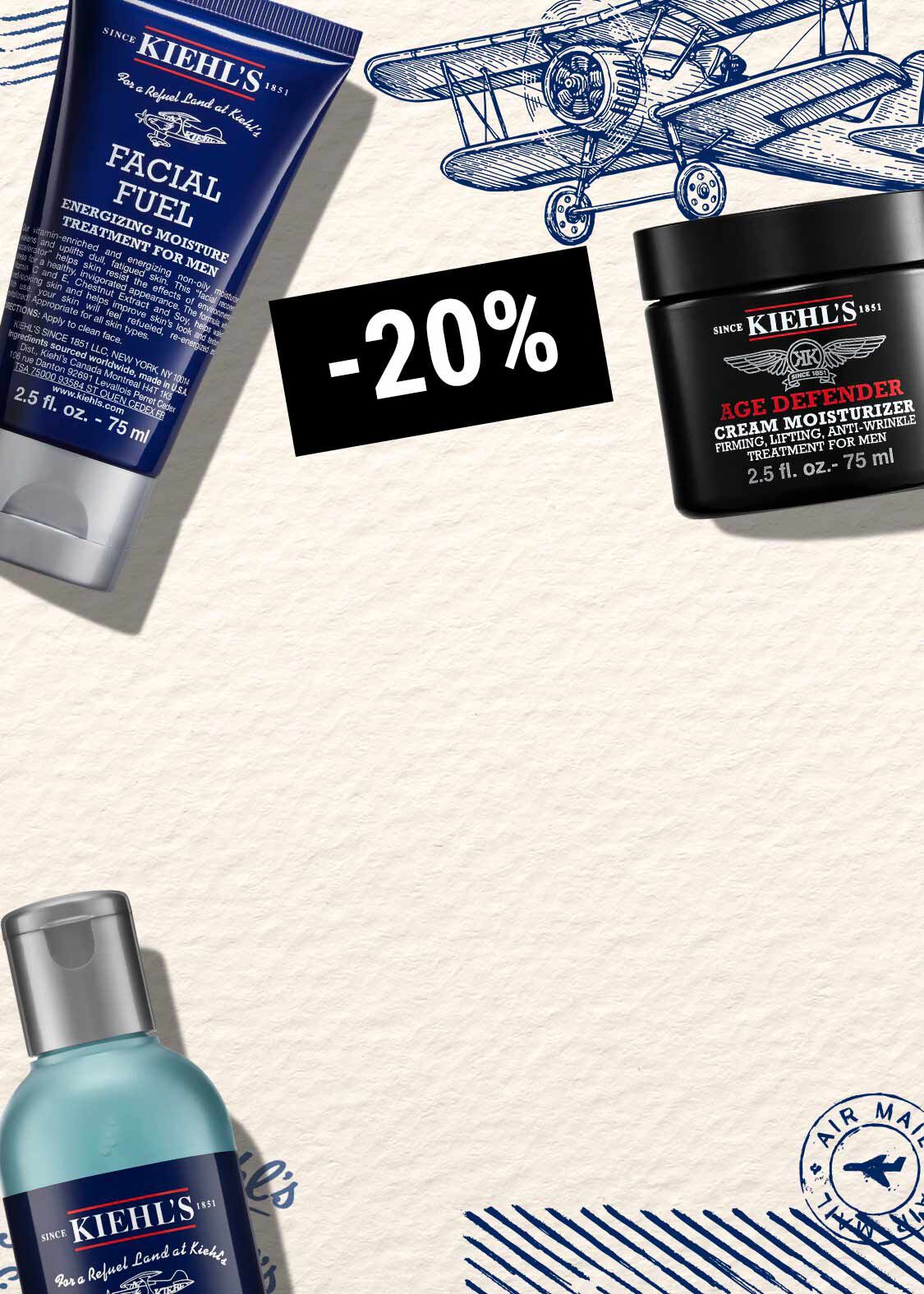 Vizual s bijelom podlogom, skicom aviona i Kiehl's proizvodima.