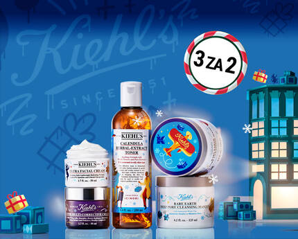 Slika prikazuje kolekciju Kiehl's proizvoda za njegu kože, uključujući kreme i tonik, s pozadinom u blagdavnom duhu s poklonima i tematskim elementima.