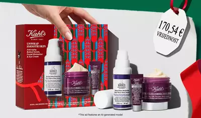 Poklon-set za njegu kože „Hydrating Holiday Hits“ na zelenoj pozadini, koji sadrži kremu Ultra Facial Cream i okoloočnu kremu Creamy Eye Treatment with Avocado u blagdanskom pakiranju.