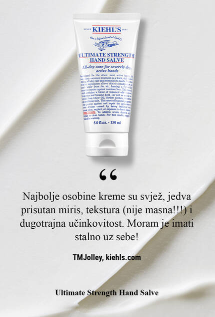 Туба с крем за ръце "Ultimate Strength Hand Salve" на Kiehl's, поставена на бяла вълнообразна повърхност. Текстът обяснява характеристиките на продукта.