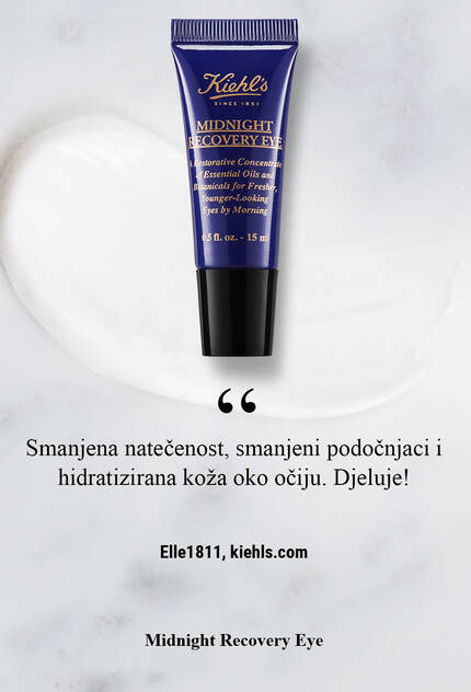 Крем за очи от Kiehl's с текст "Намалява подуването, намалява тъмните кръгове и хидратира около очите." на фона на мраморна повърхност.